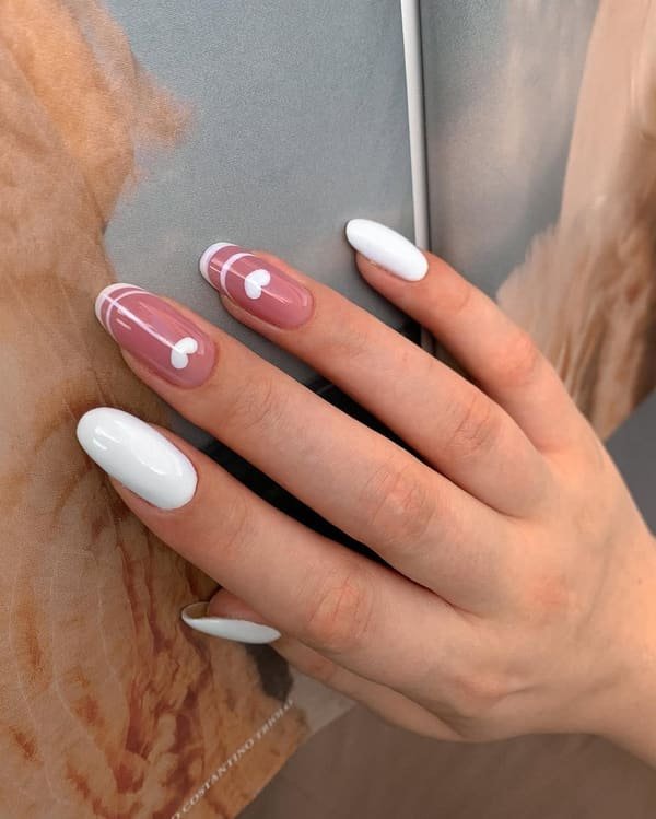 White almond builder gel nails with pink striped bow nail art